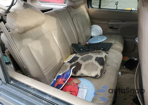 1999 Ford Explorer из США, поврежденный, VIN 1FMZU35P0XZB77099